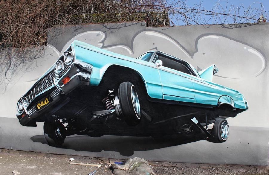 Vemos una imagen con un coche realizado por pintores de graffiti en MAdrid con el estilo Wiild Style